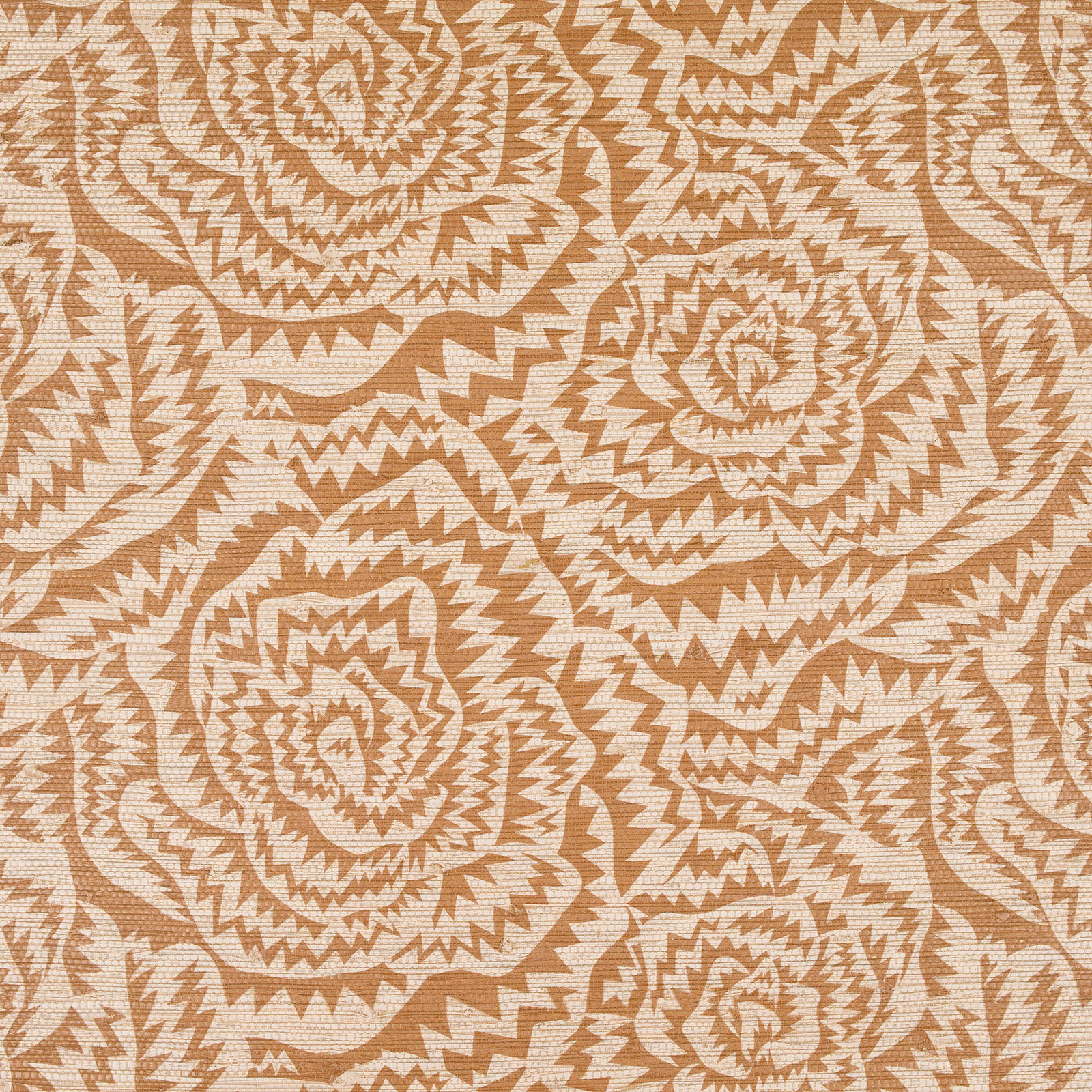 Burnt orange wallpaper with cream jagged concentric rose motifs and textured grain