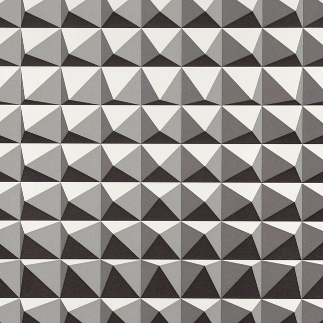 Charcoal, grey and ivory faceted pyramid triangles in a repeating geometric wallcovering