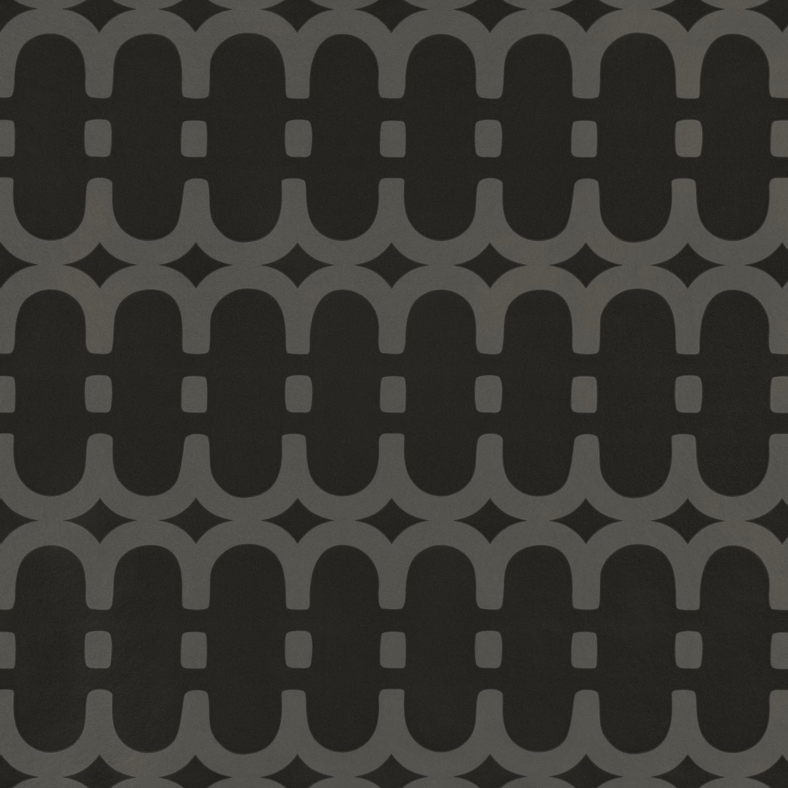 Black wallpaper with large charcoal interlocking arches and small geometric cut-outs