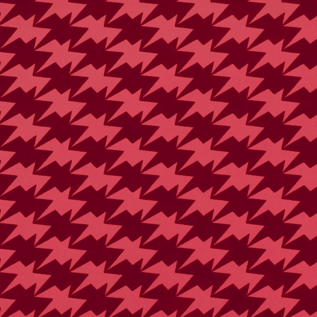 Coral-pink angular bird motifs repeating over a deep raspberry-red ground