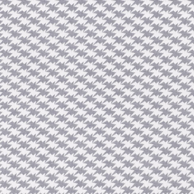 Cool grey and white fabric with small angular bird motifs in diagonal rows