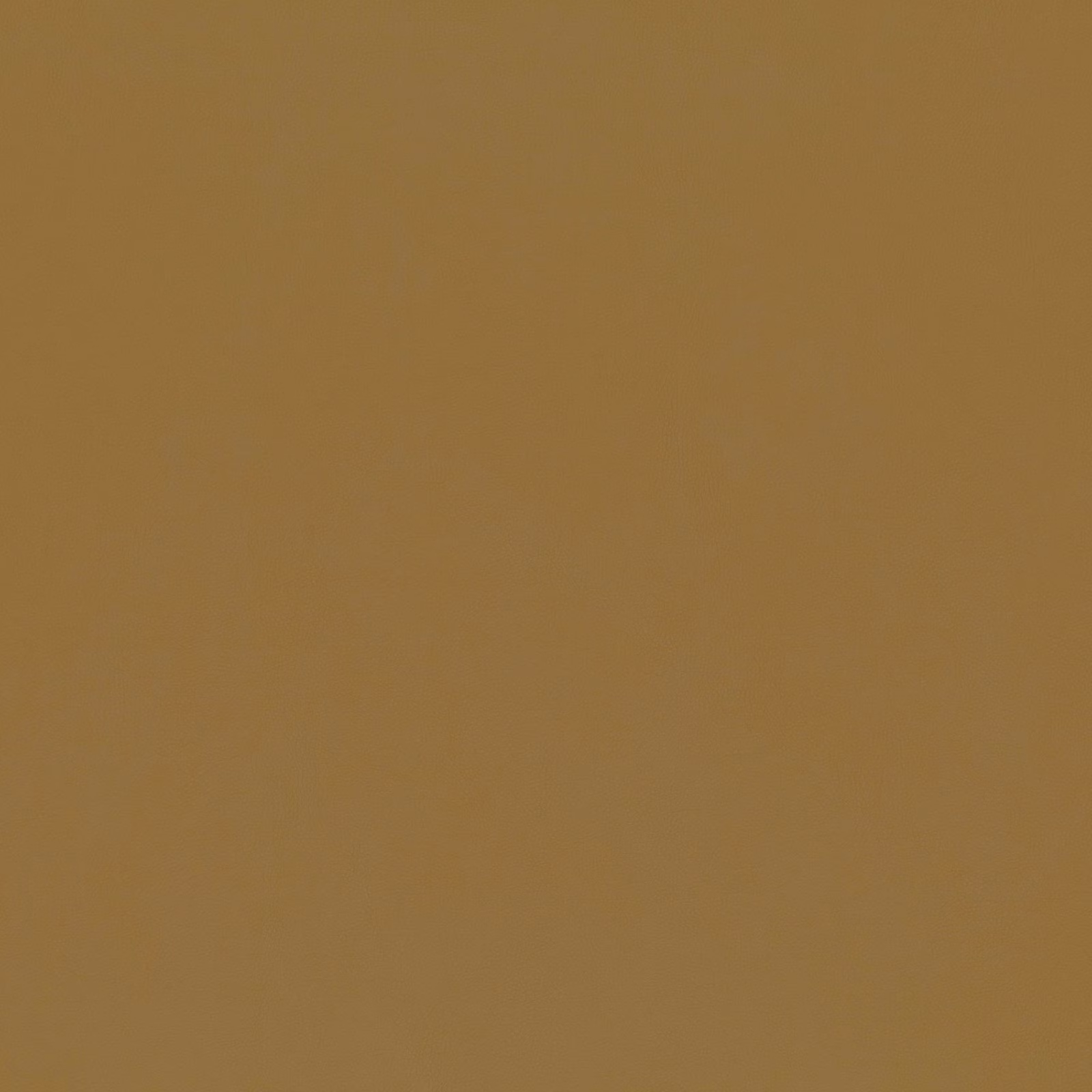 Close view of a plain golden ochre textile with a soft, even surface