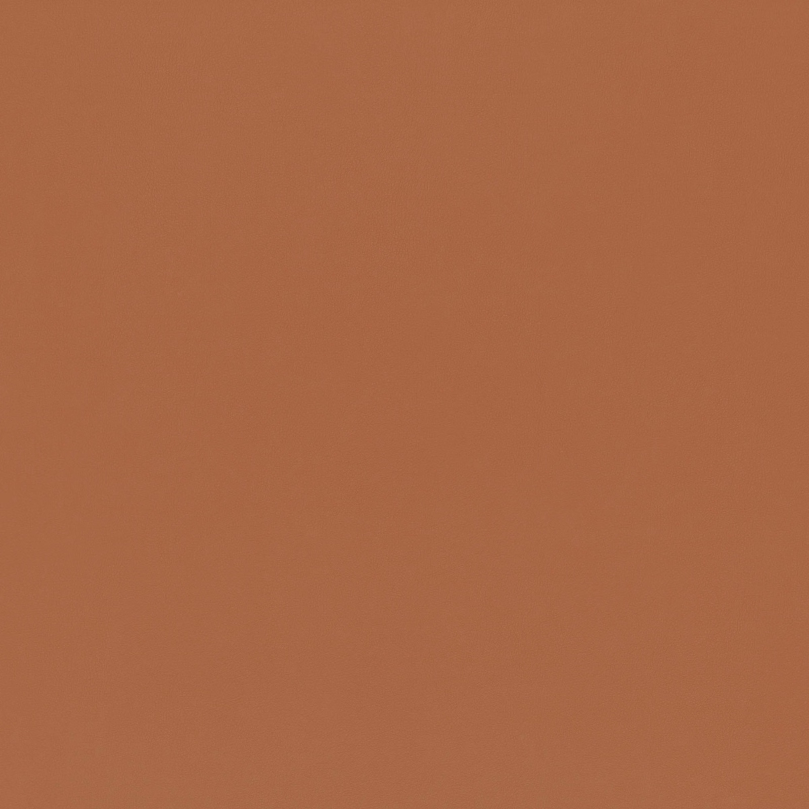 Warm clay-tan plain fabric with a fine, softly matte surface