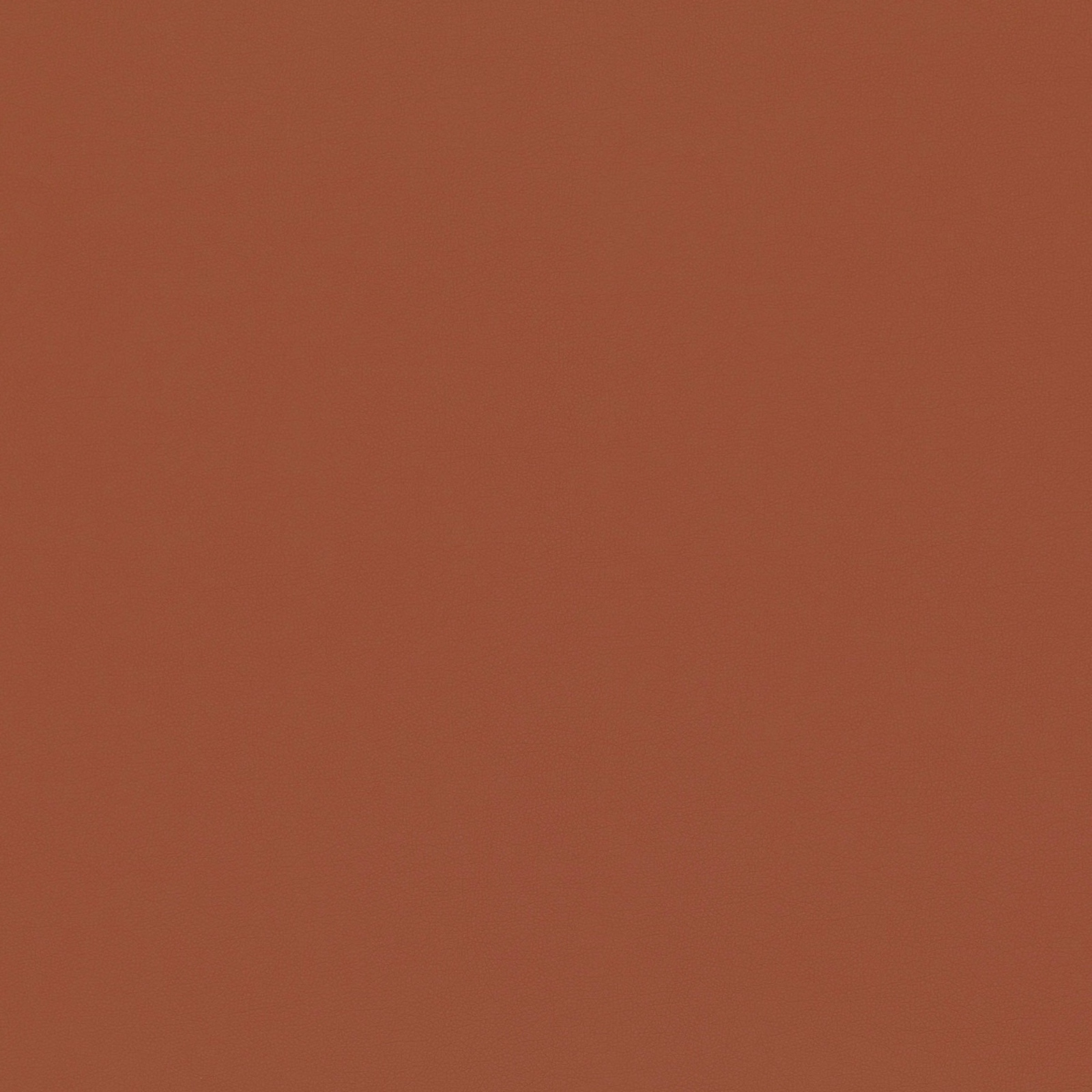 Warm burnt terracotta fabric with a subtle, even woven surface grain