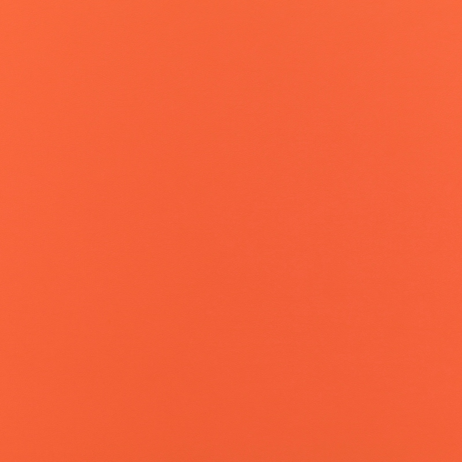 Saturated warm orange Laser fabric with a subtle fine-grain surface