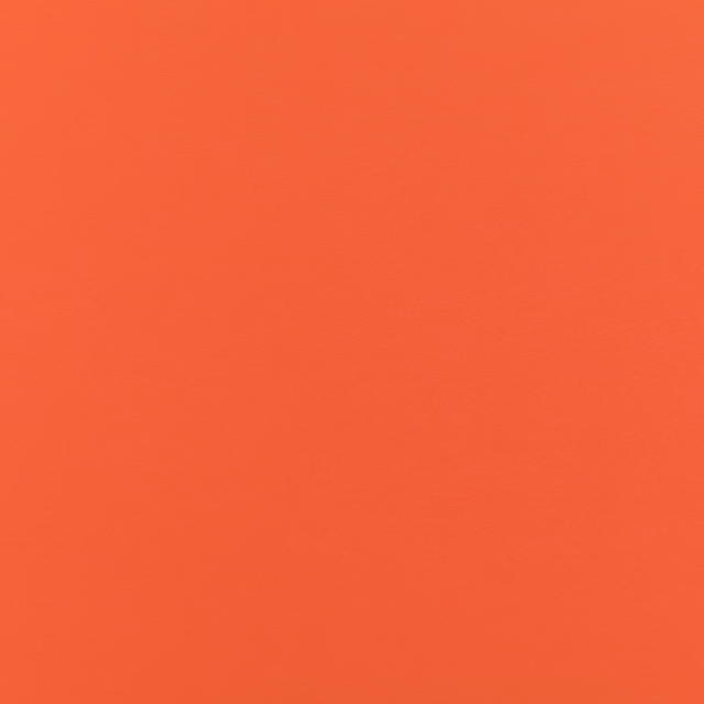 Saturated warm orange Laser fabric with a subtle fine-grain surface