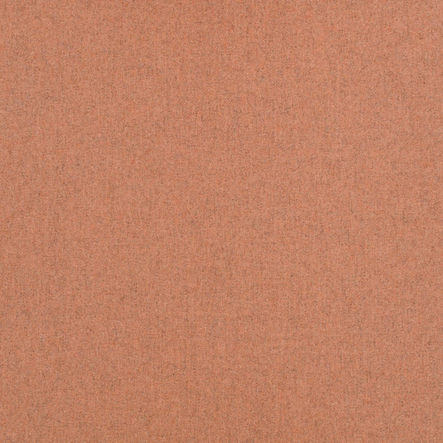 Warm amber terracotta woven swatch with fine vertical texture and darker flecks