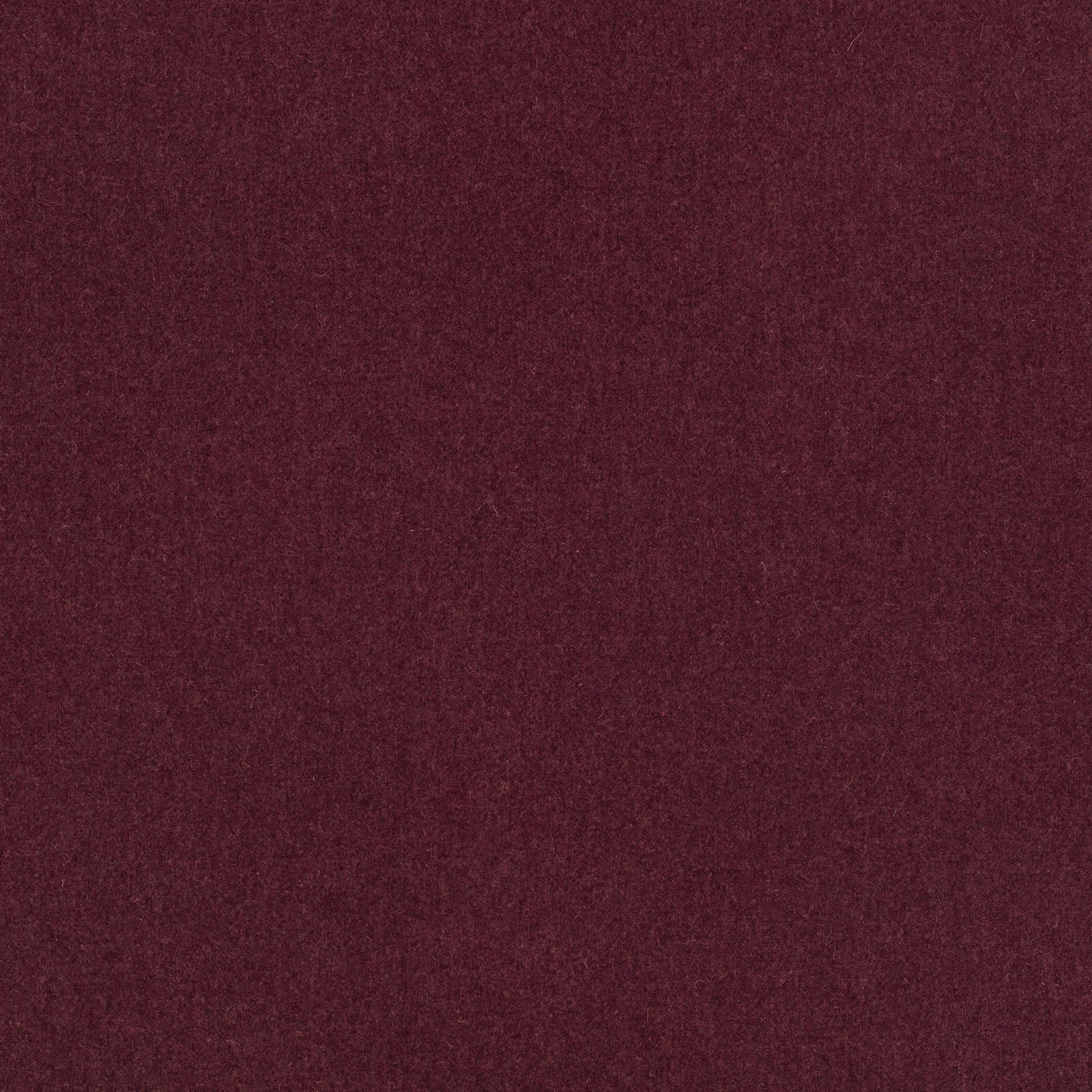 Deep aubergine fabric swatch with a fine, softly mottled low-sheen surface