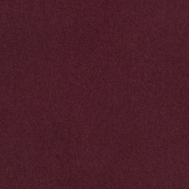 Deep aubergine fabric swatch with a fine, softly mottled low-sheen surface