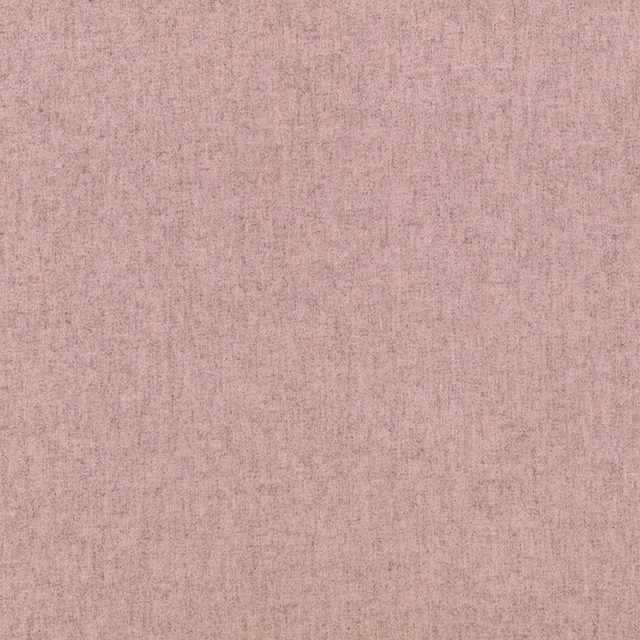 Muted chalk pink fabric with a fine, softly mottled vertical grain