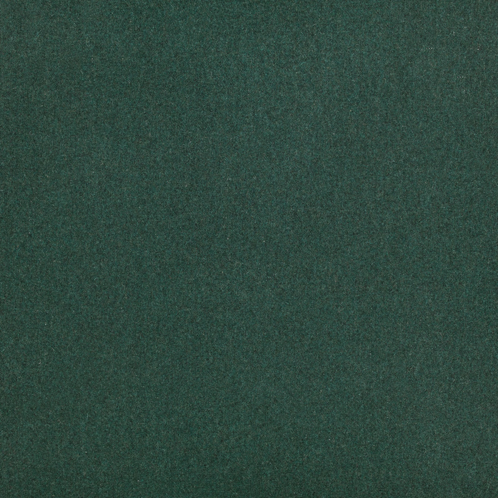 Deep pine green fabric with a softly mottled, low-sheen surface