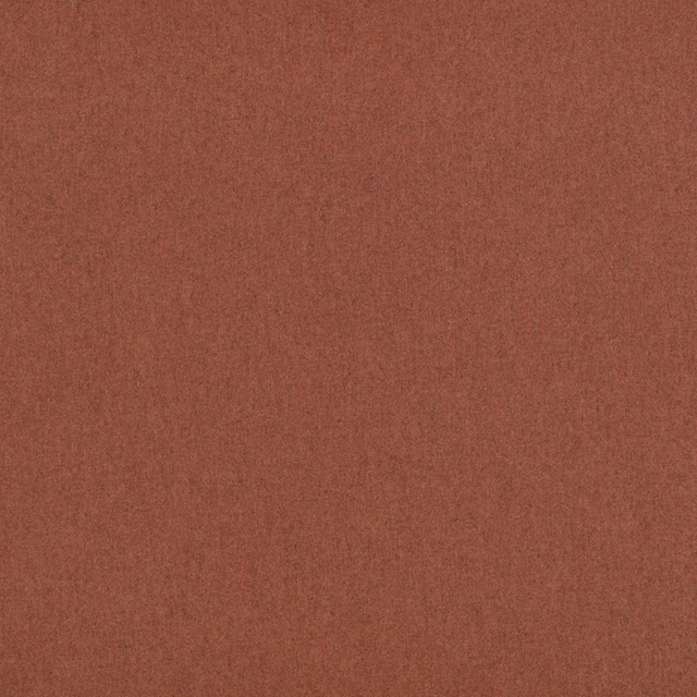 Muted russet terracotta fabric with a fine, subtly mottled woven texture