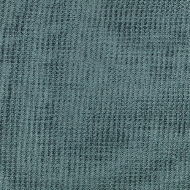 Close-up of muted dragonfly blue-green textile with a fine mottled woven texture
