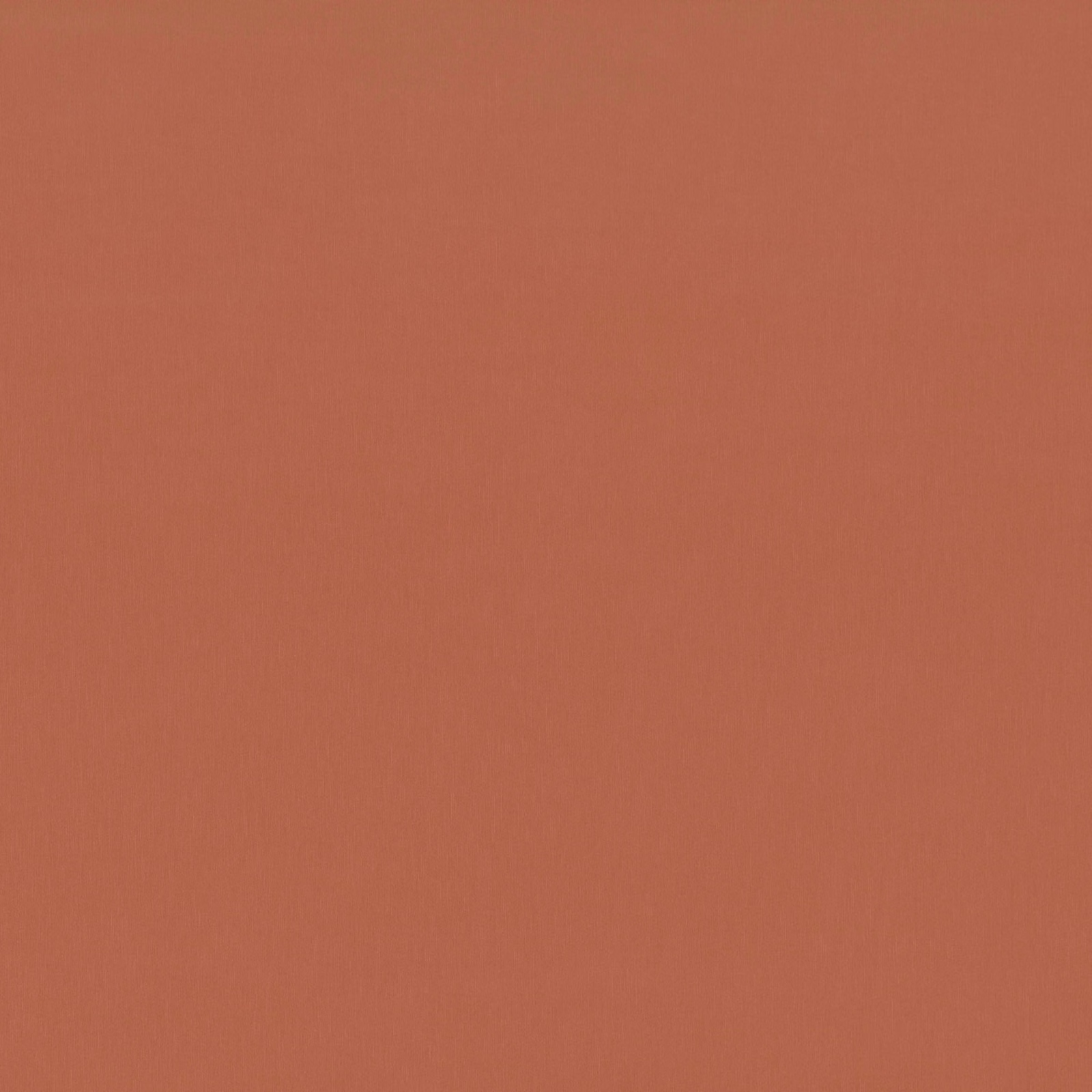 Pumpkin terracotta plain woven fabric with a fine, subtly textured surface