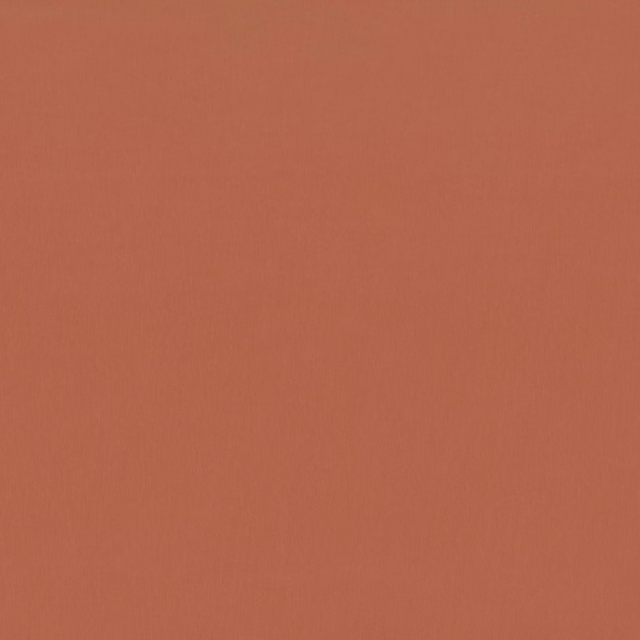 Pumpkin terracotta plain woven fabric with a fine, subtly textured surface