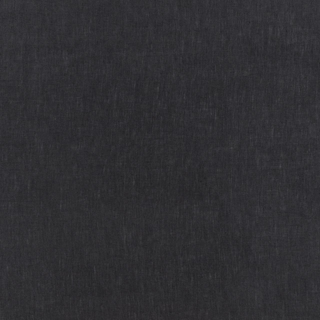 Near-black raven charcoal fabric with subtle vertical strié and tonal woven texture