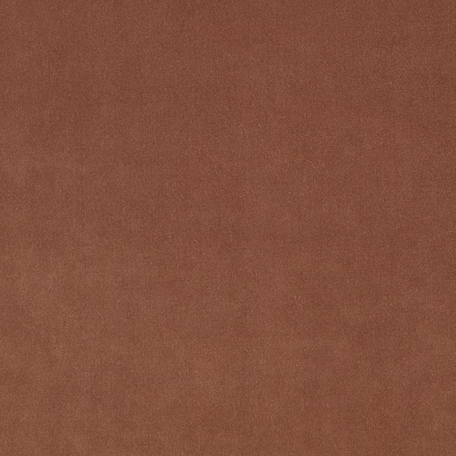 Dusty autumn pink textile with a softly mottled, warm brown-toned surface