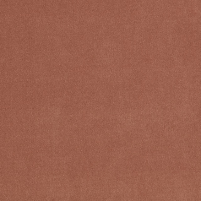 Muted cassis terracotta fabric with a fine, softly mottled plain weave