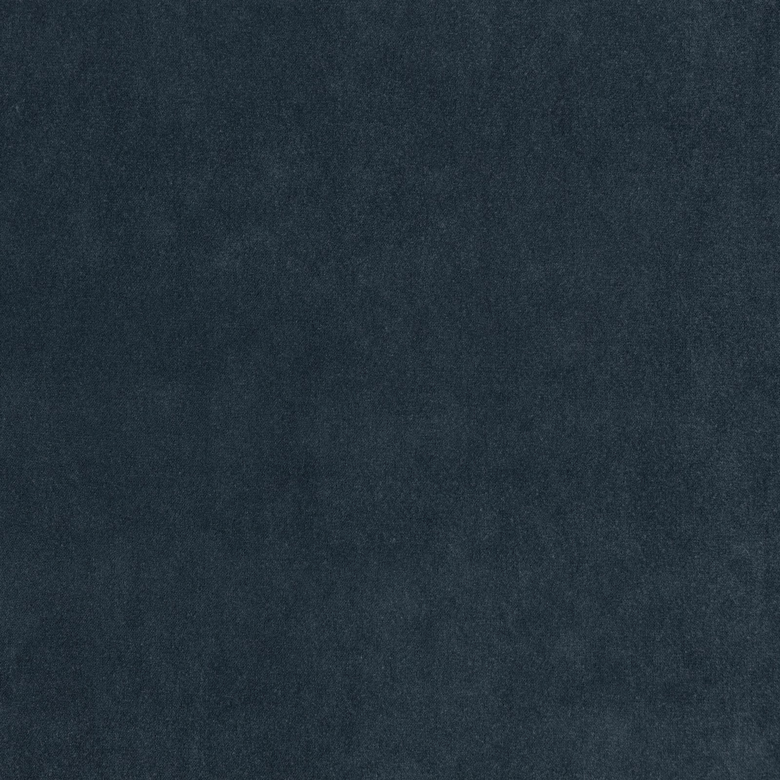 Deep indigo textile with a cloudy mottled surface and subtle woven texture