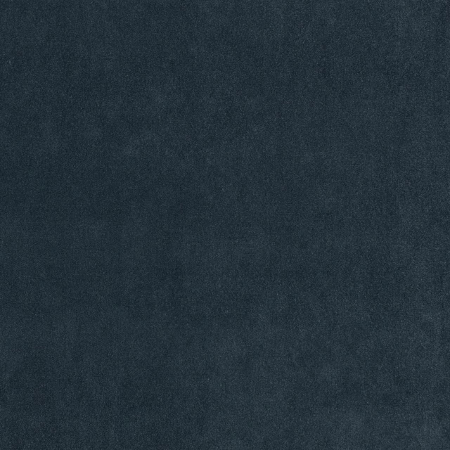 Deep indigo textile with a cloudy mottled surface and subtle woven texture