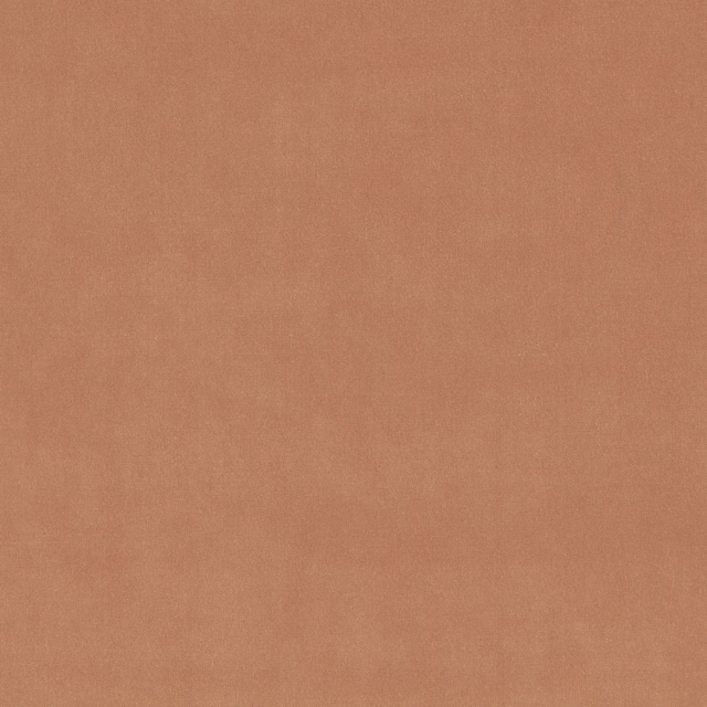 Dusty terracotta-pink Nova Fr fabric with a soft, subtly mottled woven surface