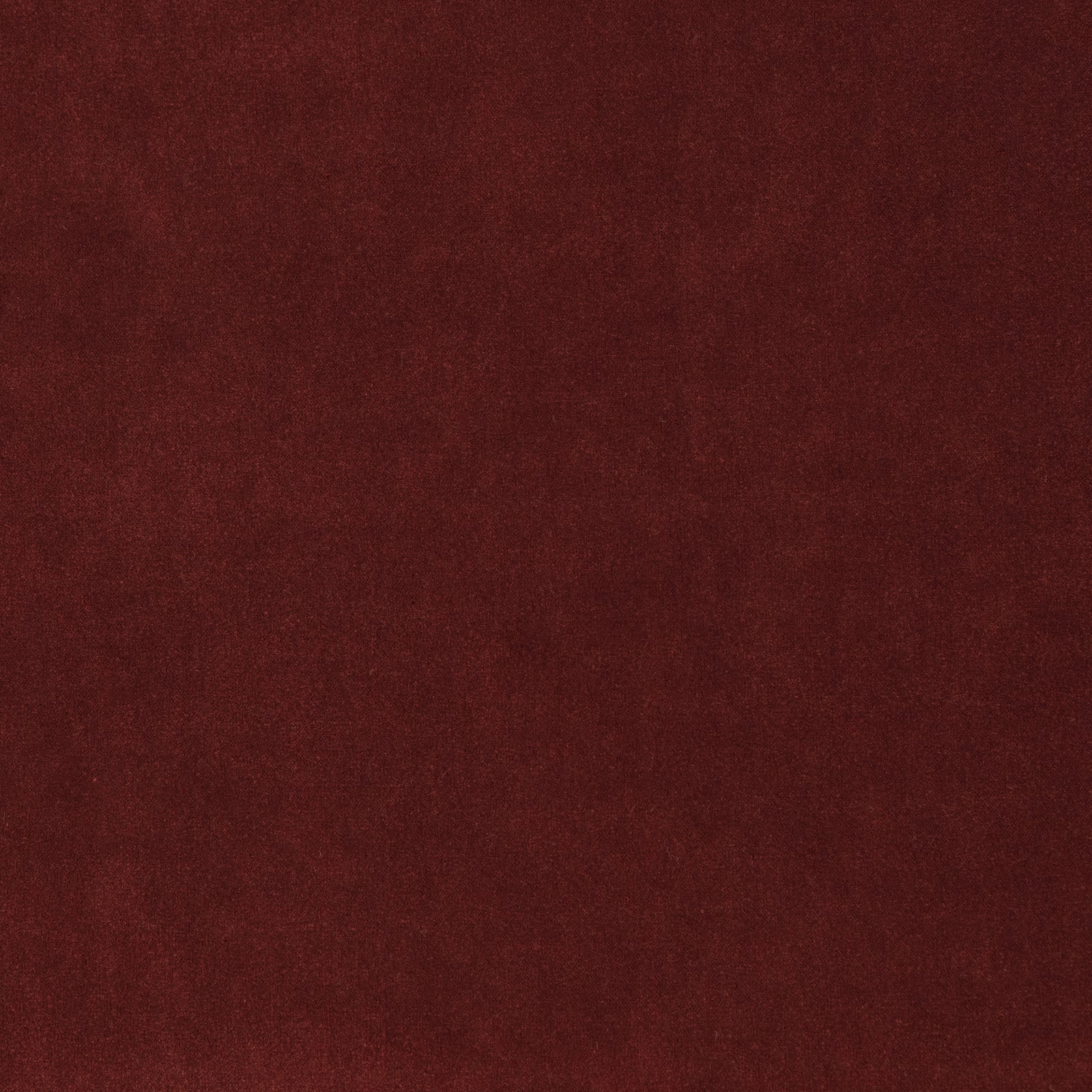 Deep burgundy-red Nova Fr Theatre fabric with a softly mottled, dense surface