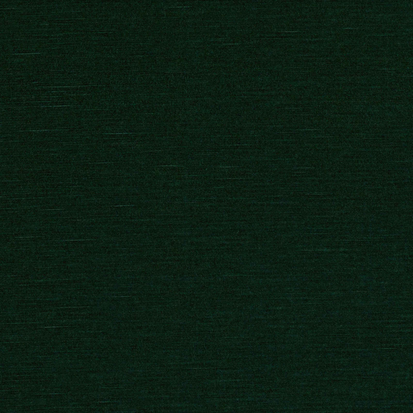 Deep evergreen textile with fine horizontal slubs and a subtly brushed surface