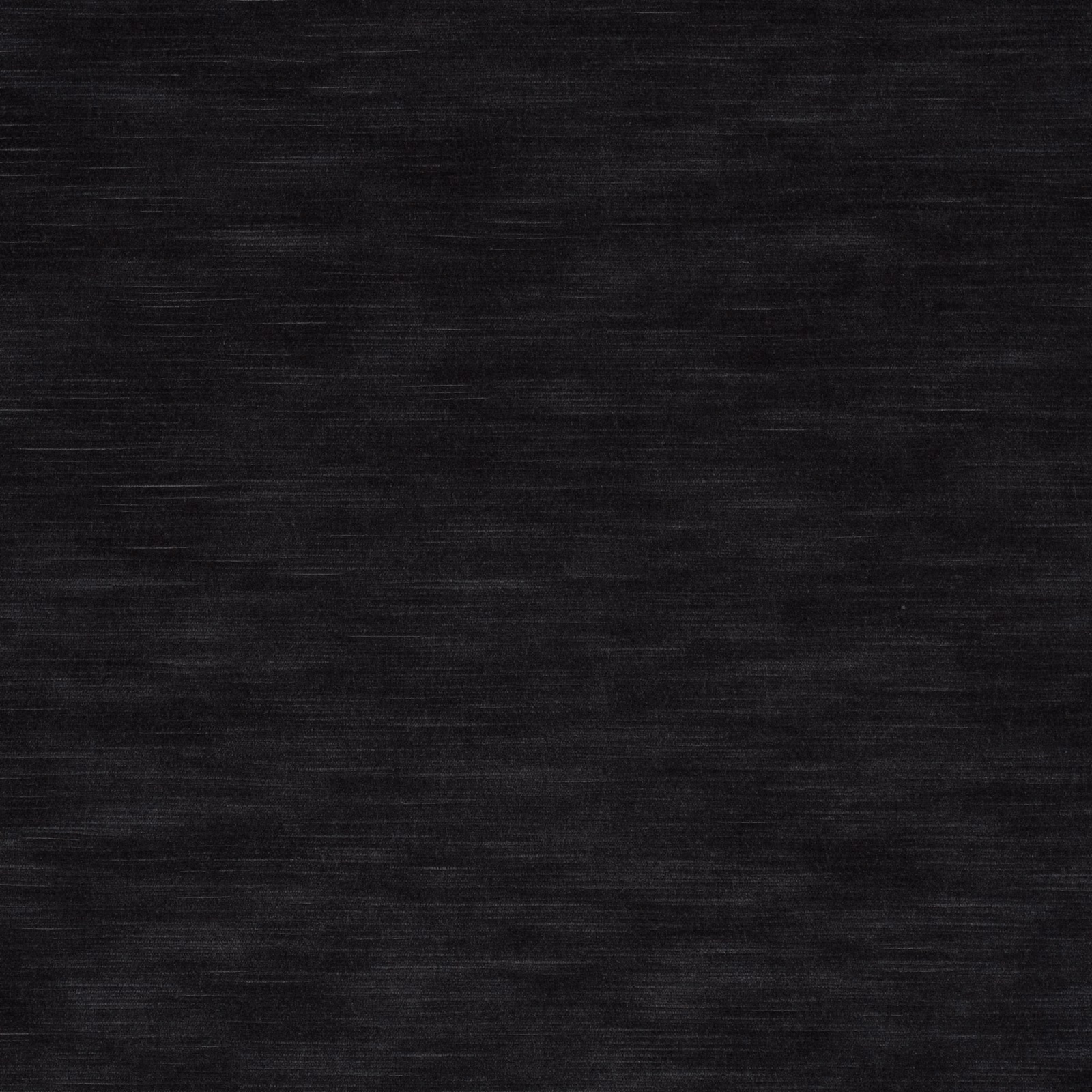 Near-black charcoal woven fabric with fine irregular horizontal striations and a softly textured surface