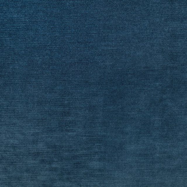 Deep indigo blue fabric with subtle horizontal striations and a softly textured surface