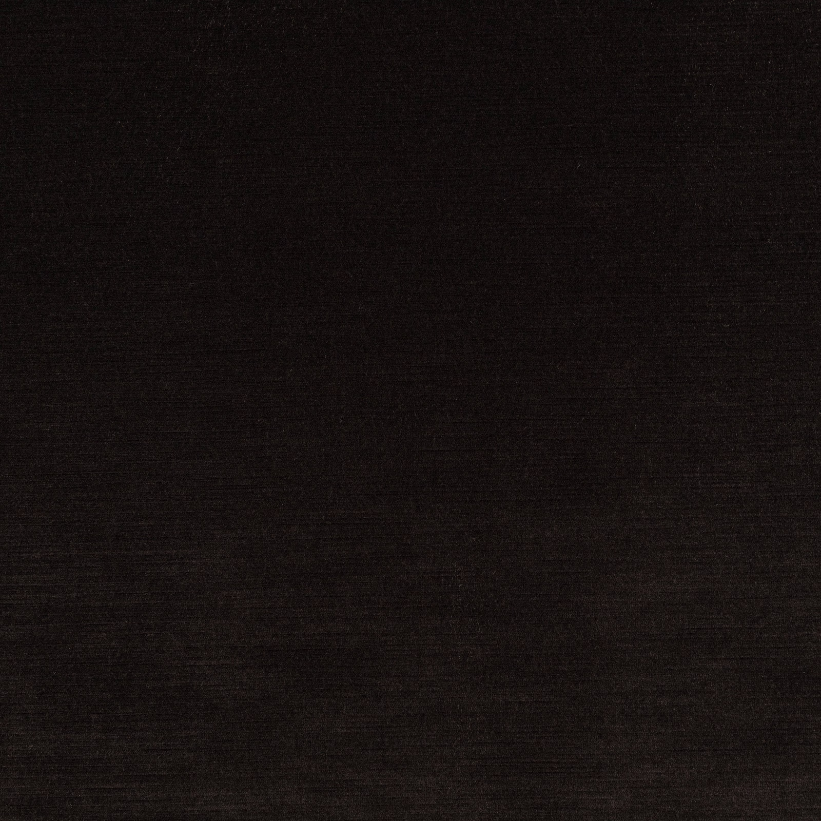 Close view of Orion III Jet Black’s subtle horizontal black woven texture