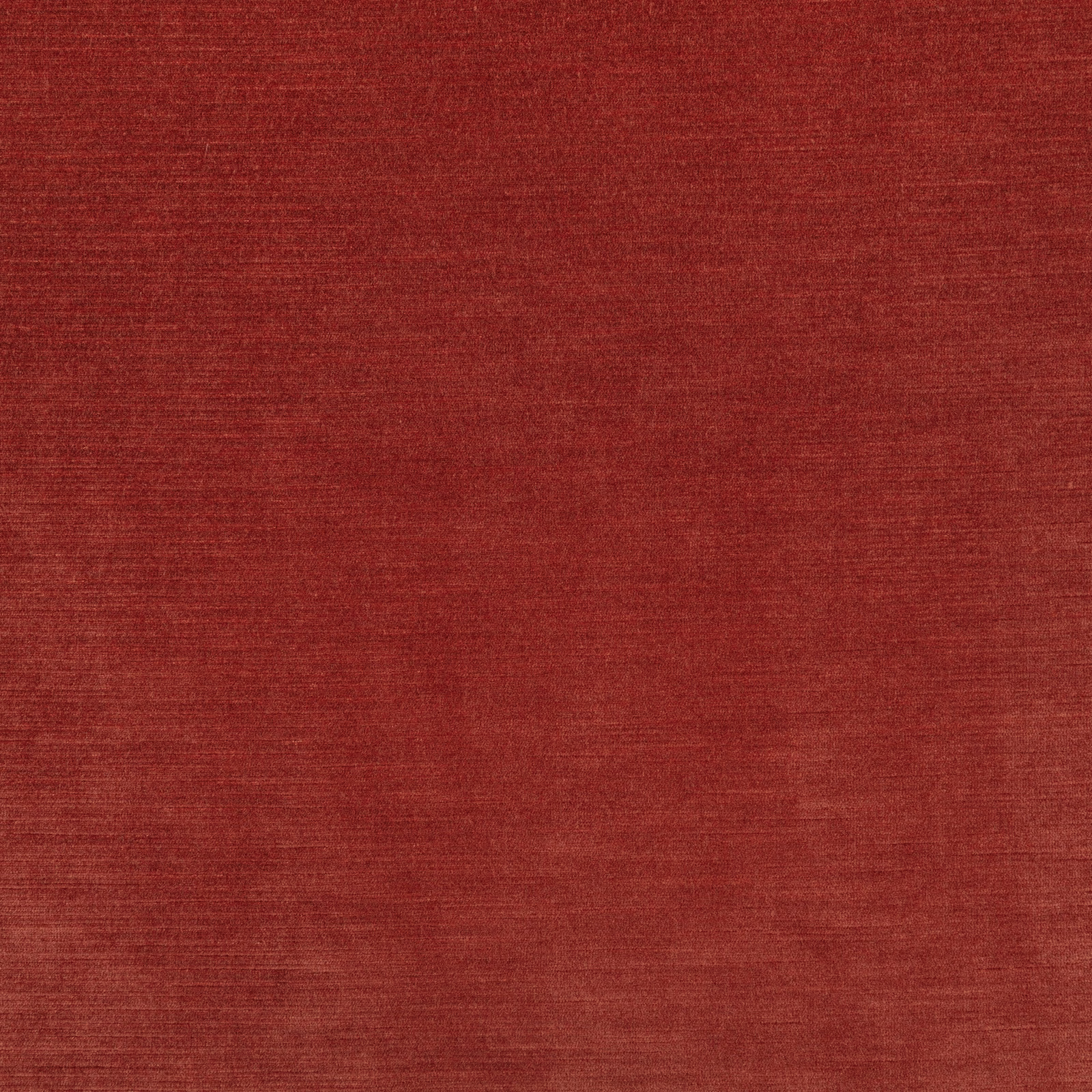 Paprika-red woven fabric with subtle horizontal slubbing and softly mottled tonal texture