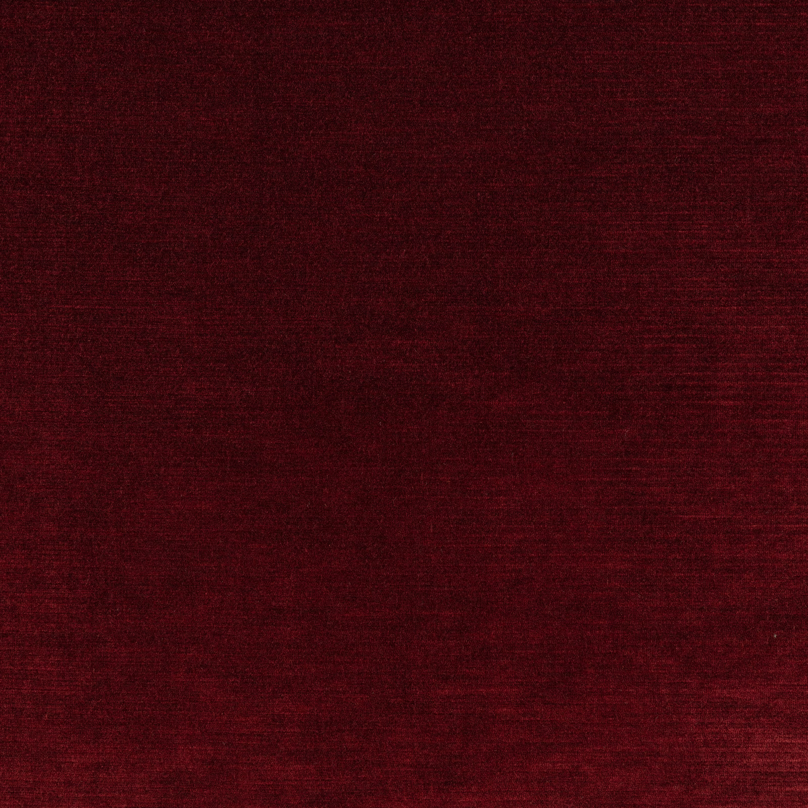 Deep ruby-red plain weave with subtle horizontal texture and darker tonal variation