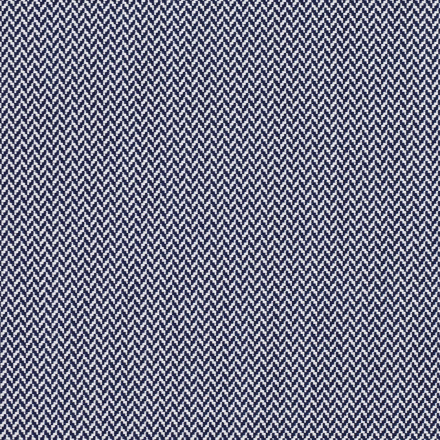 Dense navy and ivory zigzag weave with a fine herringbone texture