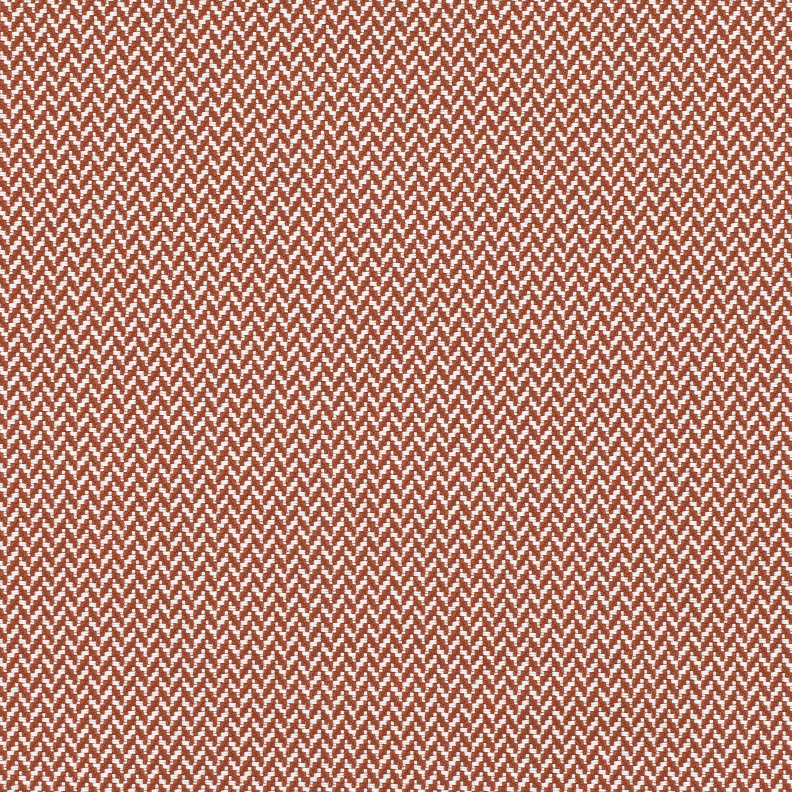 Warm terracotta fabric with a dense cream herringbone zigzag weave