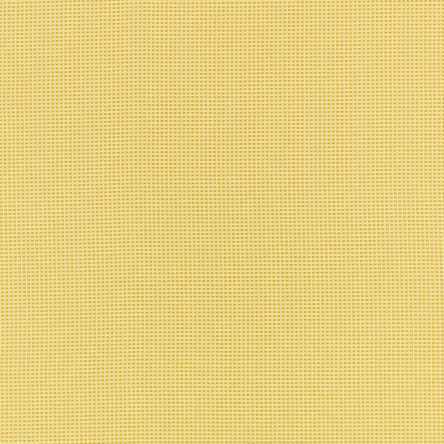Close-up of warm Dijon mustard fabric with a fine woven micro-check texture