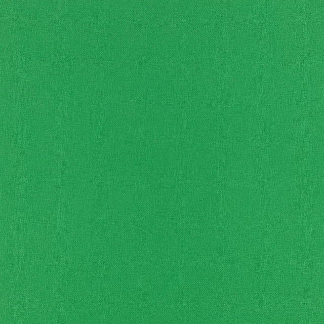 Close-up of vivid salad-green fabric with a fine, even woven texture