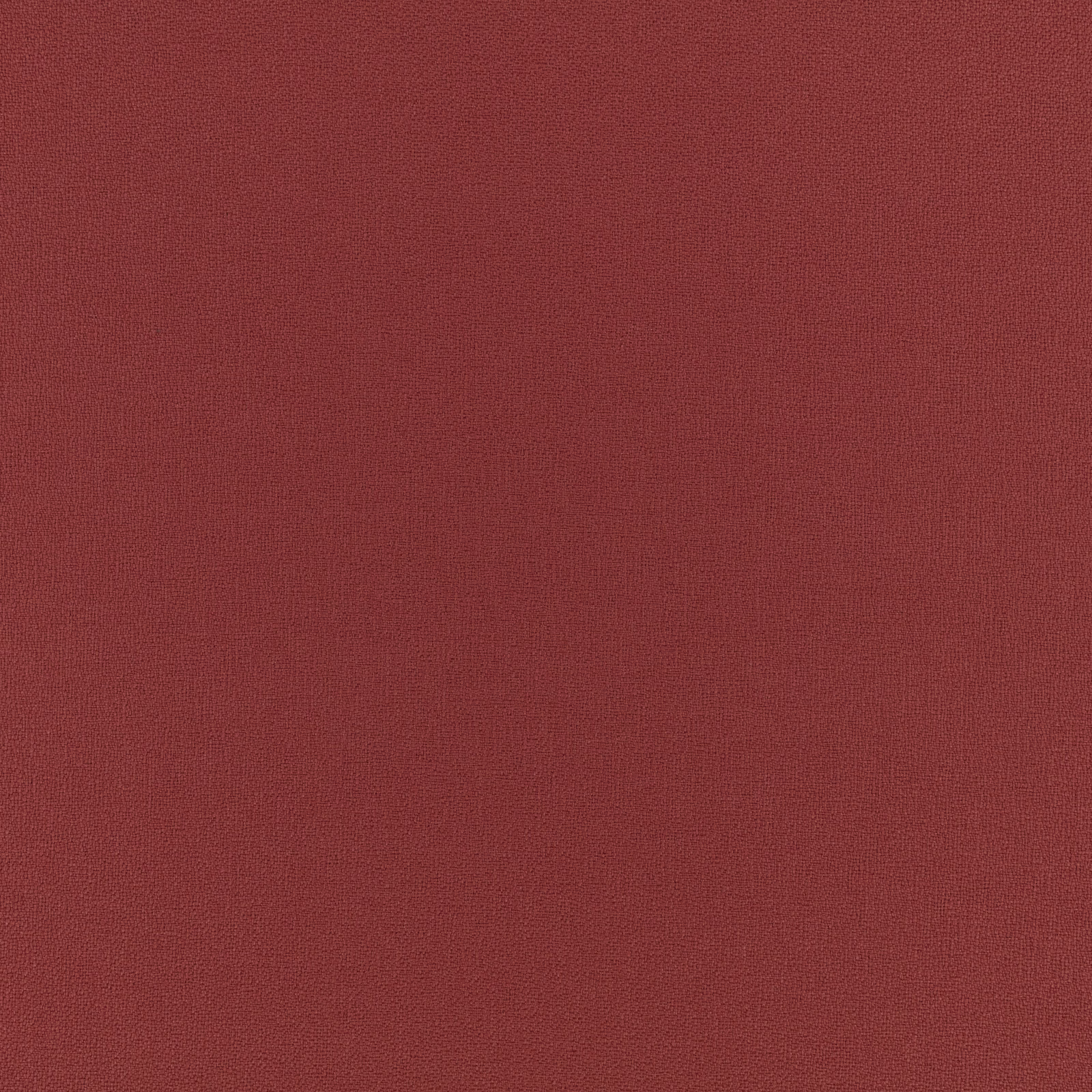 Close view of muted mulberry-red fabric with a fine, even woven texture