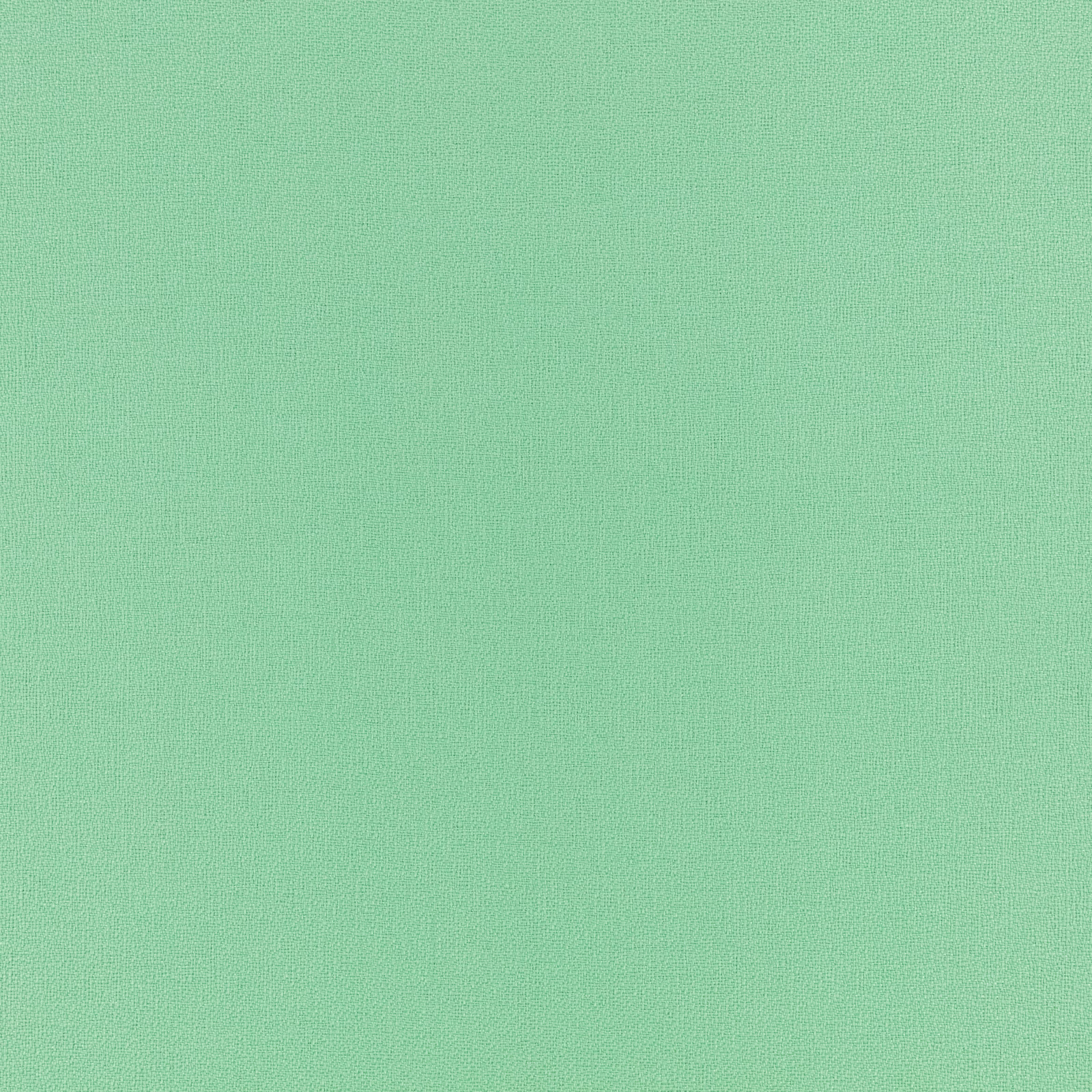 Close-up of cool spearmint green fabric with a fine, subtly textured weave