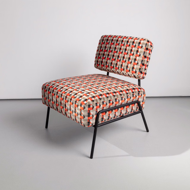 Neon orange, black, red and cream micro-check upholstery on a modern lounge chair