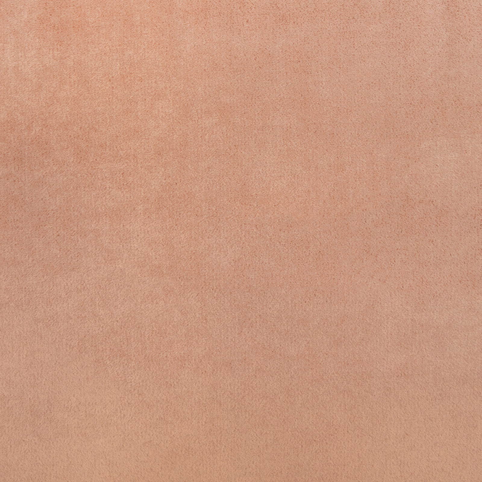 Dusty amber-peach plain fabric with softly mottled, suede-like surface texture