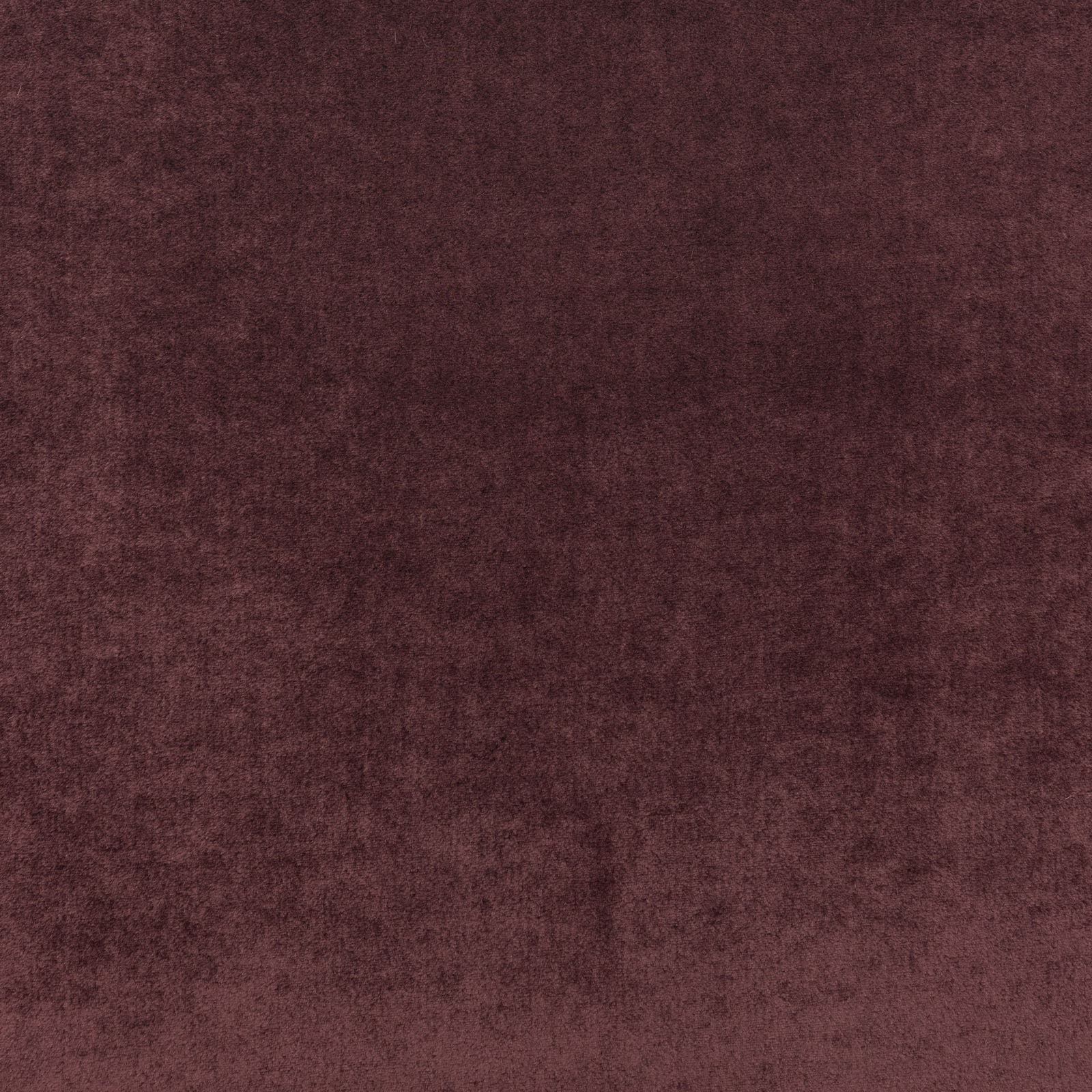 Deep aubergine plum fabric with a softly mottled, plush tonal surface