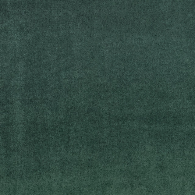 Close-up of deep pine green fabric with a soft, subtly mottled brushed texture