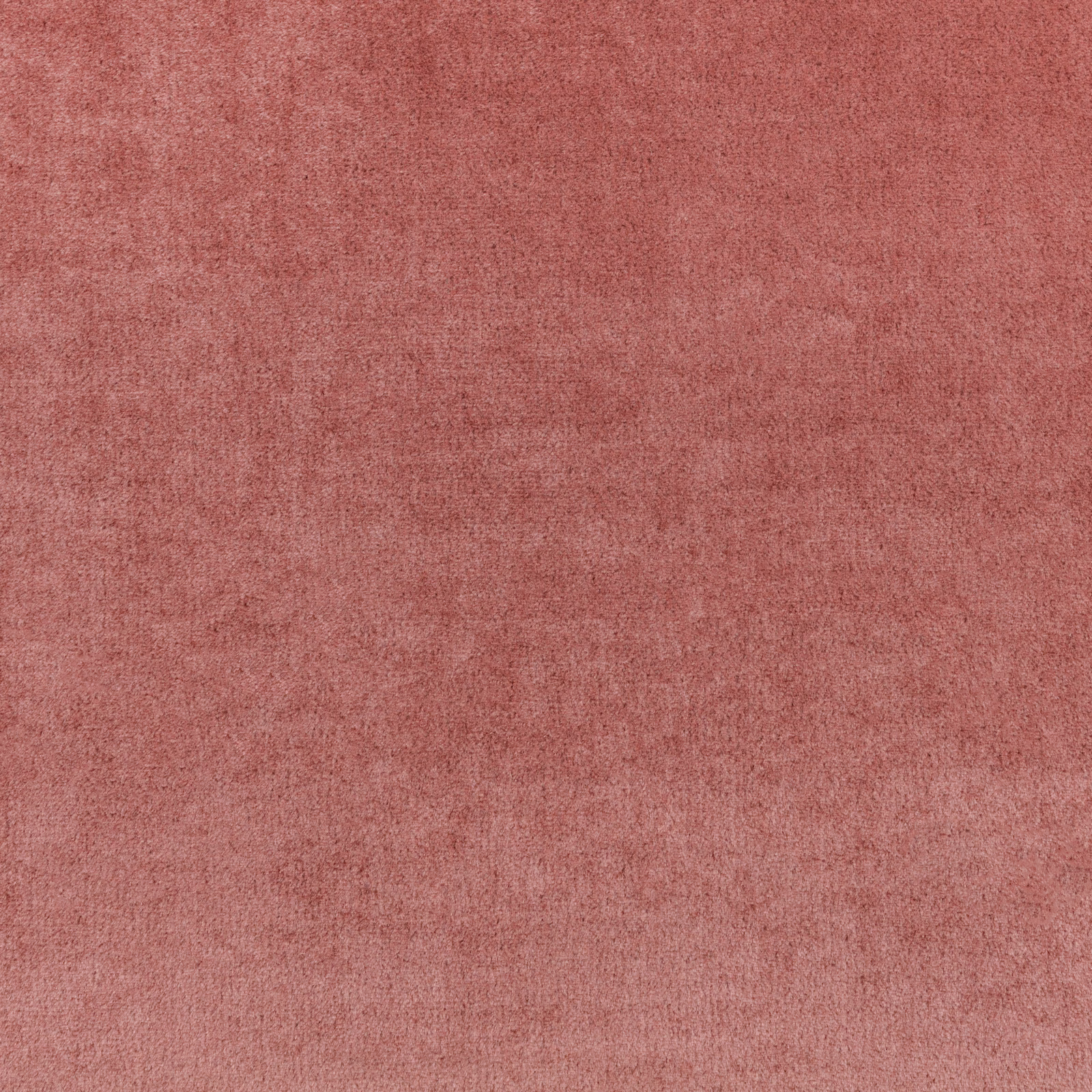 Muted blush pink plain fabric with a softly mottled, fine surface texture