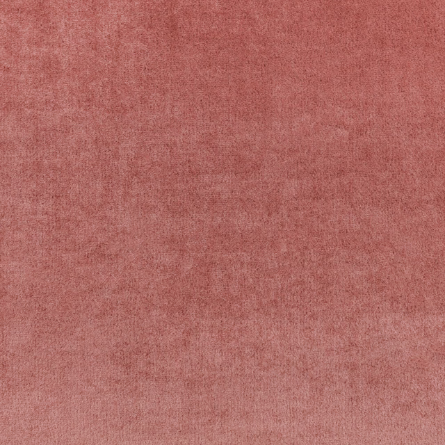 Muted blush pink plain fabric with a softly mottled, fine surface texture