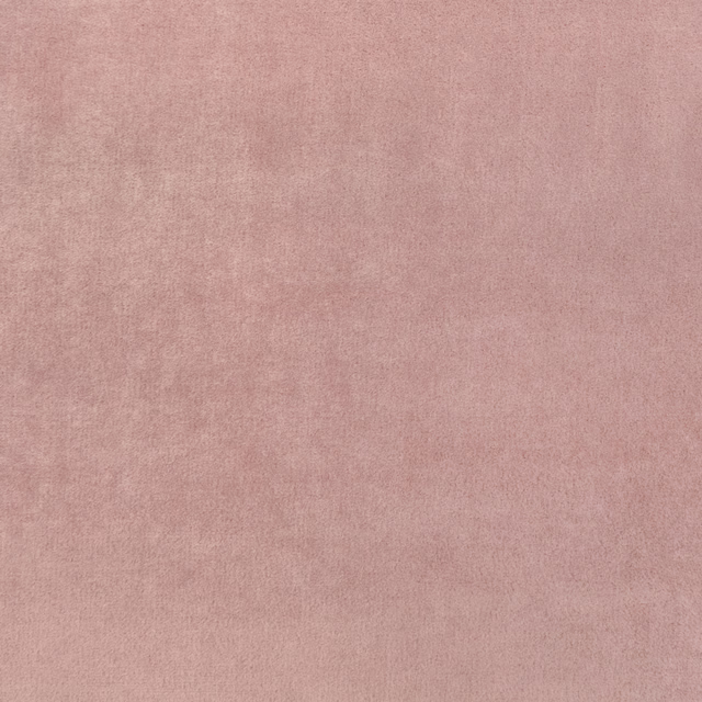 Dusty vintage rose fabric with a softly mottled, fine woven texture