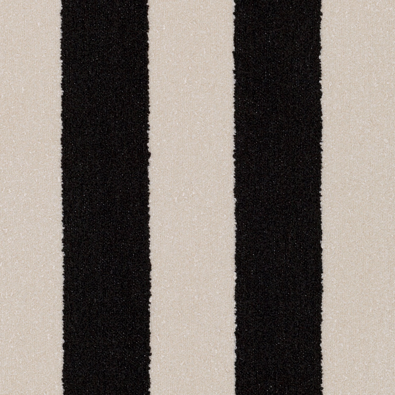 Black and ivory vertical stripe fabric with a softly textured woven surface