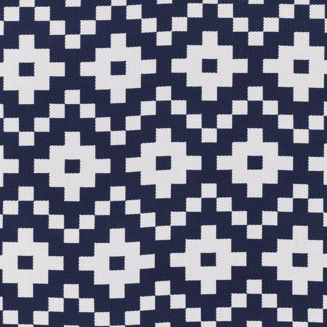 Deep navy woven ground with ivory pixel-edged floral and diamond motifs