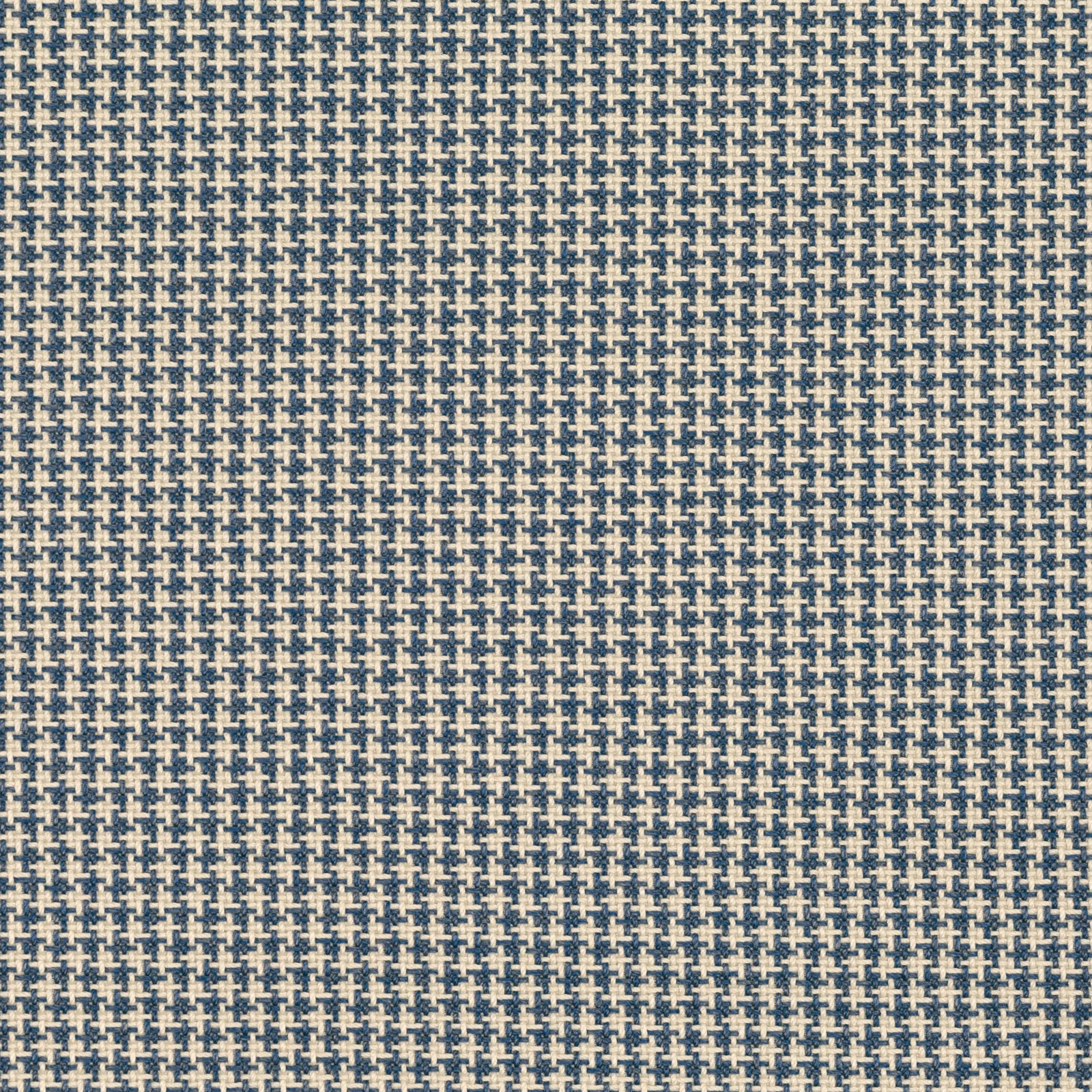 Dense indigo and ivory geometric weave with a tactile, small-scale textured surface