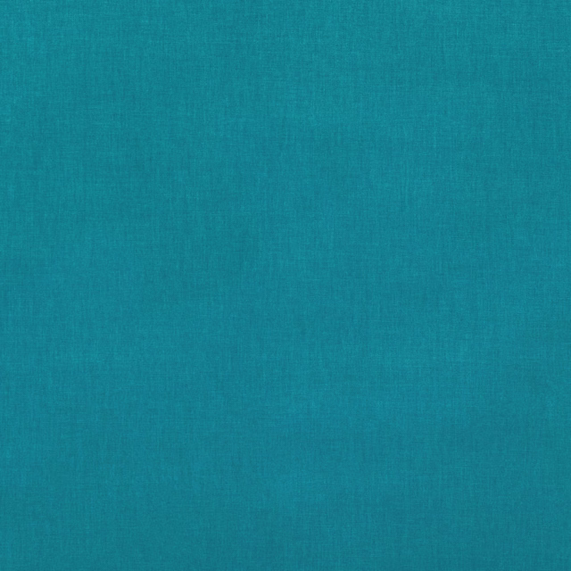 Close-up of deep cadet teal plain weave with subtle woven surface variation
