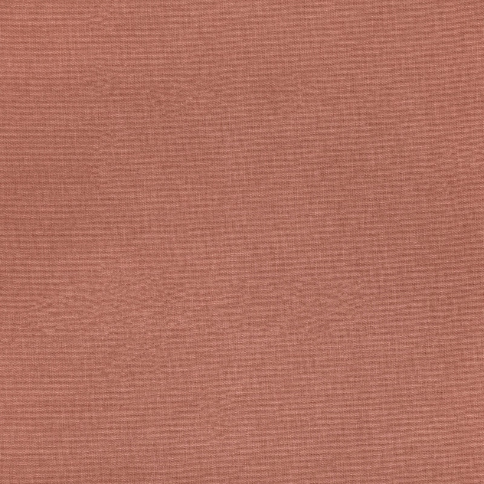 Close-up of muted terracotta plain weave with a fine, softly textured surface